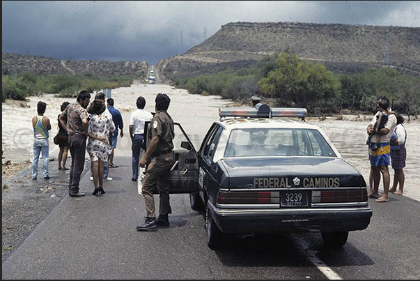 Flooded road following a Churrasco, violent storm of short duration but intense like rain