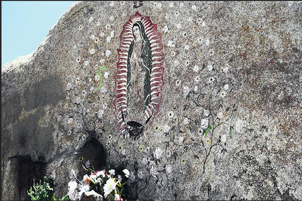 Rocky desert along Mexico 1. Votive and prayer area along the way