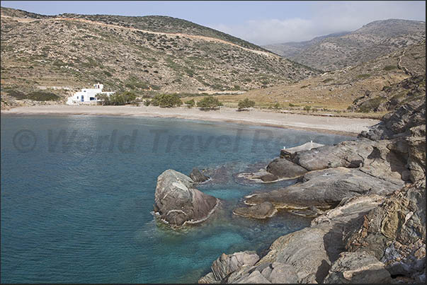South coast, Aghios Pandeleimonas Bay. Aghios Georgios beach with restaurant active only in summer South coast, Aghios Pandeleimonas Bay. Aghios Georgios beach with restaurant active only in summer
