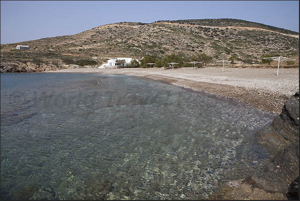 South coast, Aghios Pandeleimonas Bay. Aghios Georgios beach with restaurant active only in summer South coast, Aghios Pandeleimonas Bay. Aghios Georgios beach with restaurant active only in summer