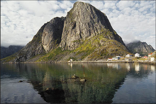 Moskenosoya Island (Lofoten), high mountains overlooking coast and villages Moskenosoya Island (Lofoten), high mountains overlooking coast and villages
