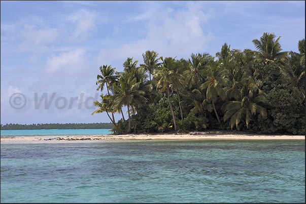 Inside the lagoon there are dozens of uninhabited islands covered by dense tropical vegetation Inside the lagoon there are dozens of uninhabited islands covered by dense tropical vegetation