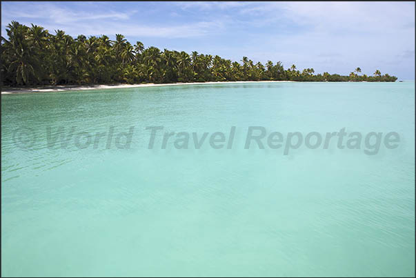 Inside the lagoon there are dozens of uninhabited islands covered by dense tropical vegetation Inside the lagoon there are dozens of uninhabited islands covered by dense tropical vegetation