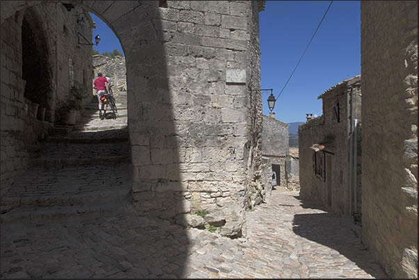 The alleys of the medieval village of Lacoste that rise towards the castle