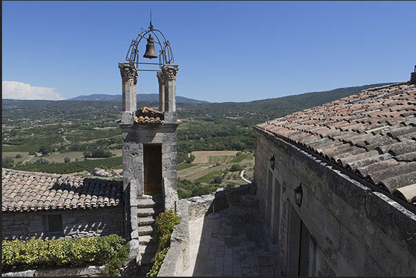 The ancient clock tower in the medieval village of Lacoste
