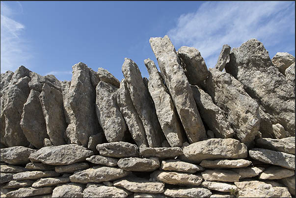 Heavy and difficult work overlapping the stones to build the village