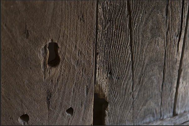 The wood of the doors is consumed by time, wind, sun and rain The wood of the doors is consumed by time, wind, sun and rain