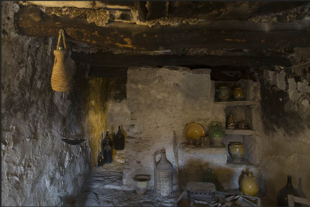 The kitchen with a small mezzanine for food supplies