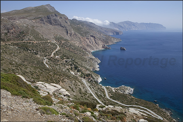Cliffs of the south coast with the road going down to Annas Beach Cliffs of the south coast with the road going down to Annas Beach