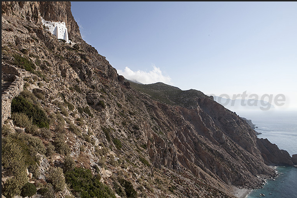 Panagia Hozoviotissa monastery reachable on foot by foot following a path carved into the cliff Panagia Hozoviotissa monastery reachable on foot by foot following a path carved into the cliff