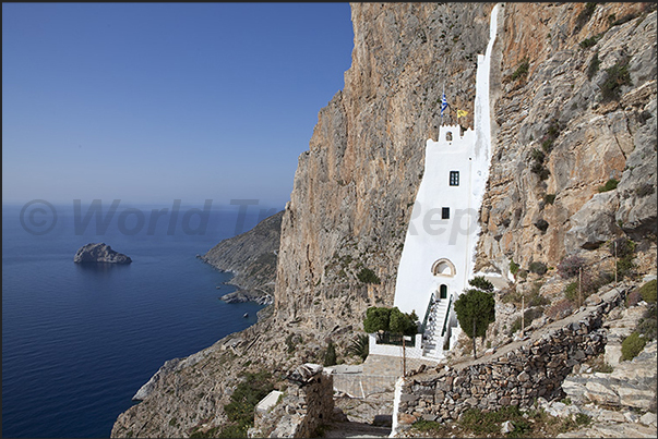 Panagia Hozoviotissa monastery nestled among the rocks of the cliff Panagia Hozoviotissa monastery nestled among the rocks of the cliff