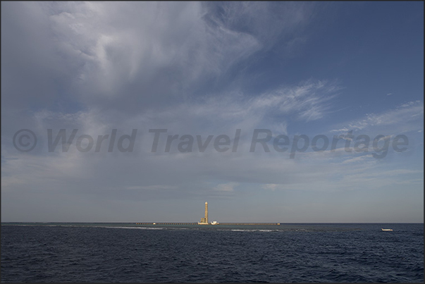 Sanganeb lighthouse at the southern tip of a large coral reef