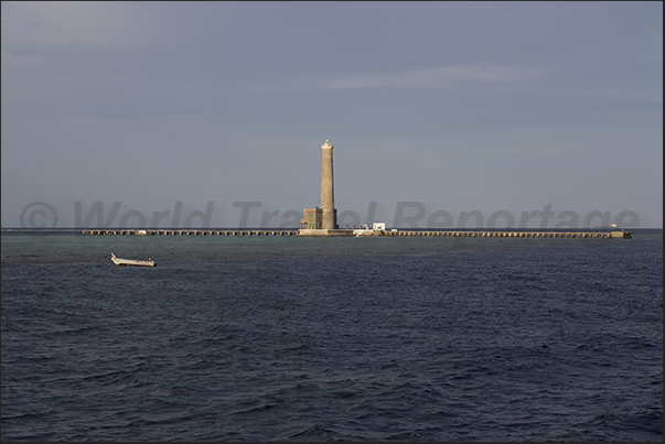 Sanganeb lighthouse with the two long access piers that cross the lagoon Sanganeb lighthouse with the two long access piers that cross the lagoon
