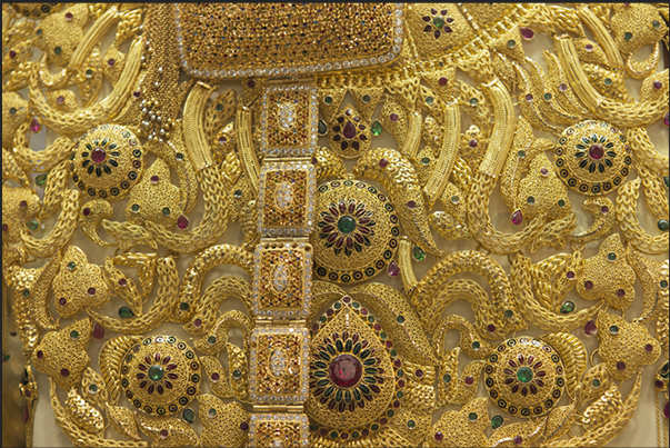 Deira, the district with the markets of spices, gold and handmade products. A t-shirt with gold and precious stones Deira, the district with the markets of spices, gold and handmade products. A t-shirt with gold and precious stones