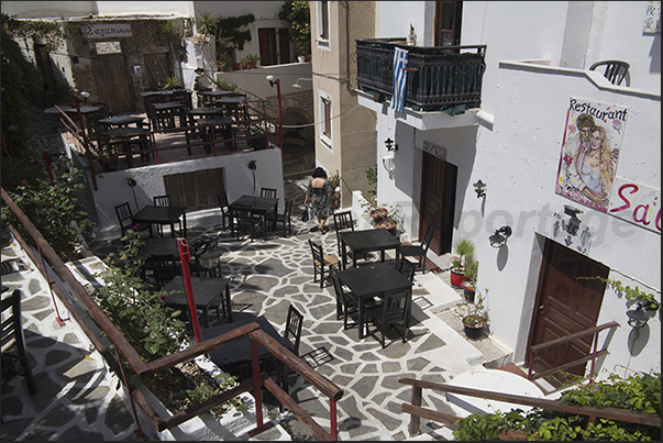 The small squares of the historic center are occupied by the tables of the taverns The small squares of the historic center are occupied by the tables of the taverns