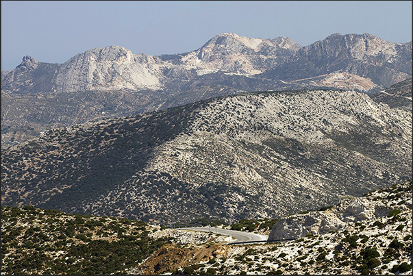 Mountains with the marble quarries of Latomia seen from the road leading to Kalanigou bay