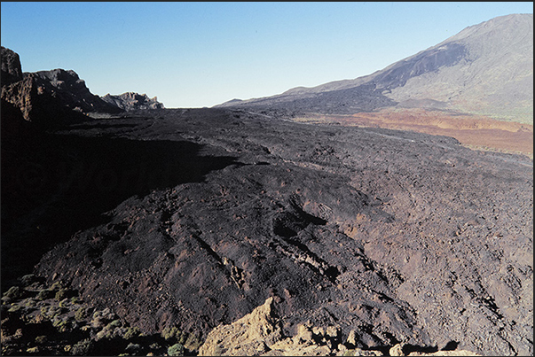 La Canadas del Teide the plateau at the base of Pico del Teide framed by rocky walls La Canadas del Teide the plateau at the base of Pico del Teide framed by rocky walls