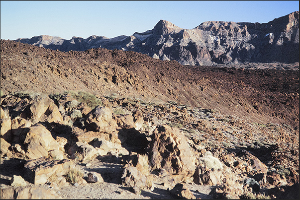 La Canadas del Teide the plateau at the base of Pico del Teide framed by rocky walls La Canadas del Teide the plateau at the base of Pico del Teide framed by rocky walls