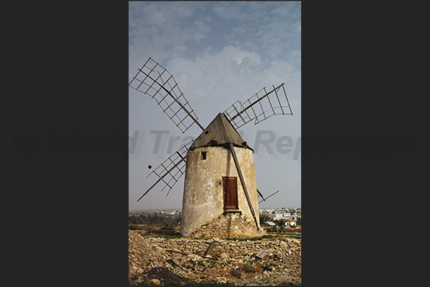 Near the villages in the interior of the island there are often new and old windmills Near the villages in the interior of the island there are often new and old windmills