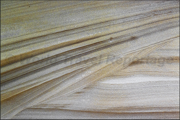 Jandia Natural Park, south west coast. Layers of sand present along the roads that cross the park Jandia Natural Park, south west coast. Layers of sand present along the roads that cross the park
