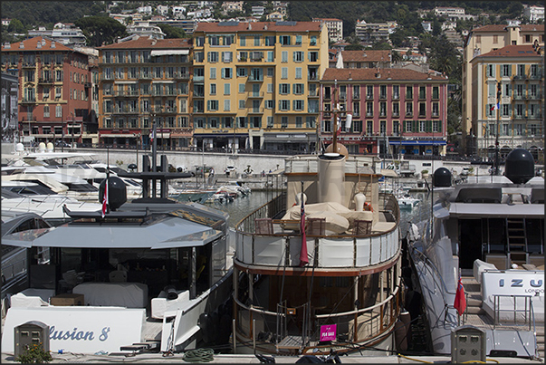 Port Lympia, the old port of Nice. Ancient buildings overlook the eastern side of the Quai des Docks Port Lympia, the old port of Nice. Ancient buildings overlook the eastern side of the Quai des Docks