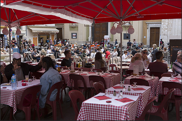 Place Rossetti the square in front of the Sainte Réparate cathedral crowded with tables and tourists Place Rossetti the square in front of the Sainte Réparate cathedral crowded with tables and tourists