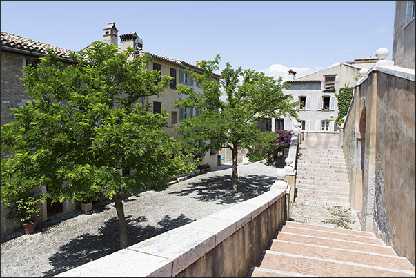 The double staircase that leads to the gates of the castle of the Grimaldi square