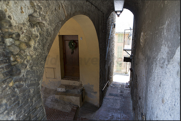 Narrow alleys connect the small streets of the village creating a maze of passages Narrow alleys connect the small streets of the village creating a maze of passages