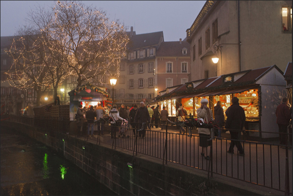 The squares and streets of Colmar, during Christmas time are filled with stalls with typical products of Alsace Region The squares and streets of Colmar, during Christmas time are filled with stalls with typical products of Alsace Region
