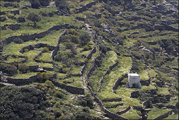 Paths flank dry stone walls and terraced crops characterize the valleys of the island Paths flank dry stone walls and terraced crops characterize the valleys of the island