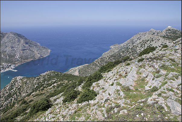 Panorama from the church of Aghia Simeon on the Kamares bay. In the distance, the church of Profitis Ilias Troulakiou