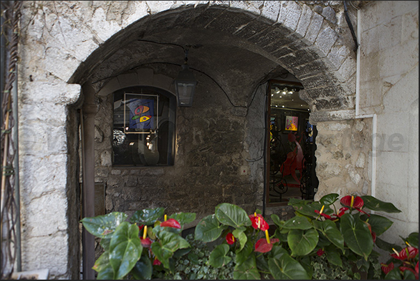 Shop along Rue Grande, the main street of the village Shop along Rue Grande, the main street of the village