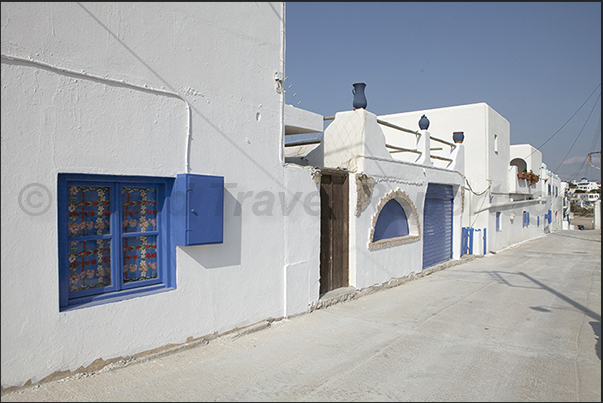 White and blue are the dominant colors in the town of Hora White and blue are the dominant colors in the town of Hora