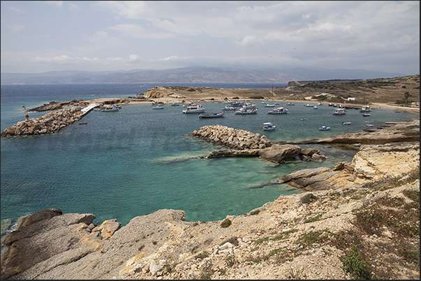 Fishing port of Potamia (west coast) and the island of Naxos on the horizon Fishing port of Potamia (west coast) and the island of Naxos on the horizon