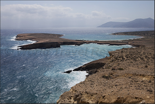 South east coast. Kavos Pori peninsula and the uninhabited island of Keros on the horizon