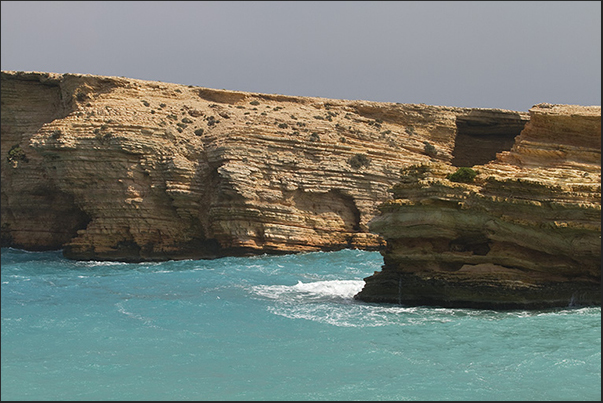 The rugged cliffs of Ksylobatis Bay (north east coast) The rugged cliffs of Ksylobatis Bay (north east coast)