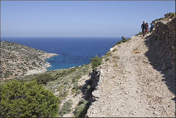 Path along the north coast leading to the caves of Polyphinos and Aghios Ioannis. Path along the north coast leading to the caves of Polyphinos and Aghios Ioannis.