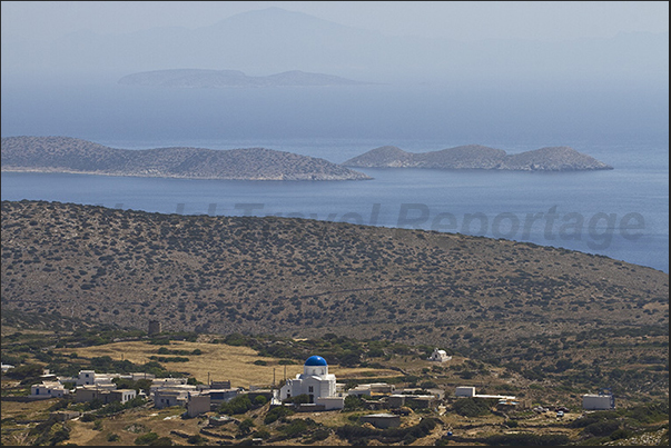 Panagia church of Pano Horio. In front of the islands of Aghrilou and Kato Antikeri. On the horizon Amorgos island Panagia church of Pano Horio. In front of the islands of Aghrilou and Kato Antikeri. On the horizon Amorgos island