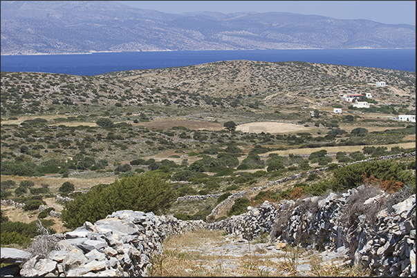 The channel that separates Heraklia from the island of Naxos on the horizon The channel that separates Heraklia from the island of Naxos on the horizon