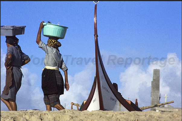 At the end of the day, the fishermen's families share the catch