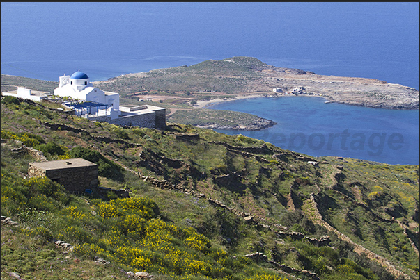 North coast. Moni Taxiarhci Monastery. Below the bay of Platis Gialos North coast. Moni Taxiarhci Monastery. Below the bay of Platis Gialos