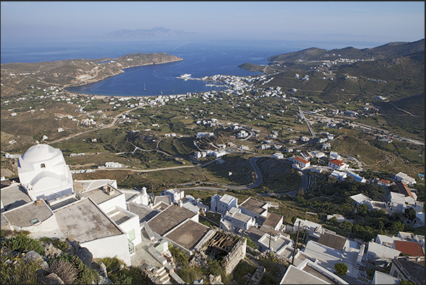 Panorama of the bay with the port of Livadi and the island of Sifnos on the horizon