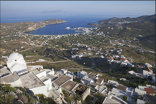 Panorama of the bay with the port of Livadi and the island of Sifnos on the horizon Panorama of the bay with the port of Livadi and the island of Sifnos on the horizon
