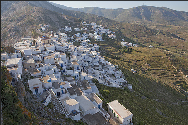 The town of Chora spreads out on the hillside overlooking the Livadi bay The town of Chora spreads out on the hillside overlooking the Livadi bay