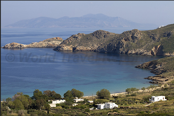 South East coast. Lia bay and on the horizon the island of Sifnos South East coast. Lia bay and on the horizon the island of Sifnos