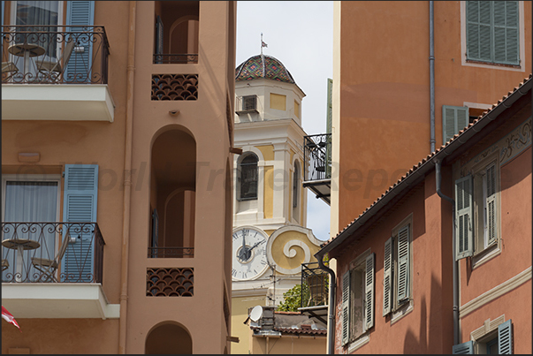 Among the houses overlooking the port you can glimpse the bell tower of the cathedral Among the houses overlooking the port you can glimpse the bell tower of the cathedral