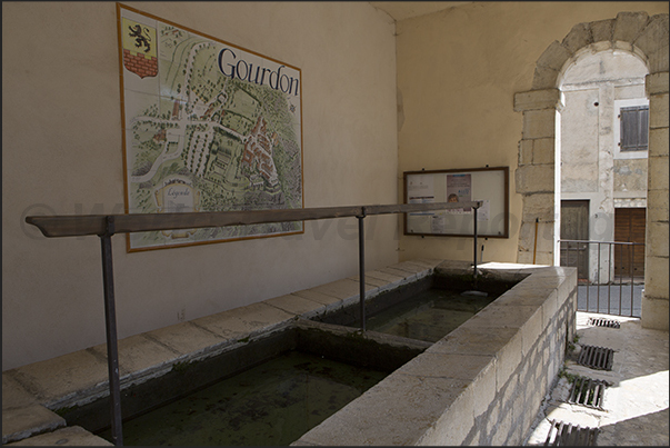 Washhouse square at the entrance to the town. The wash house