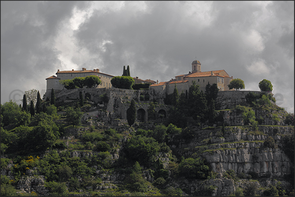 The ancient village of Gourdon on the top of a rocky spur The ancient village of Gourdon on the top of a rocky spur