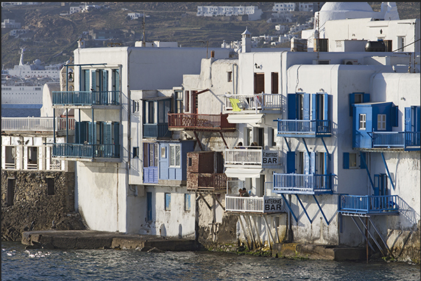 Ancient buildings overlook the sea with restaurants and clubs for aperitifs and cheerful evenings