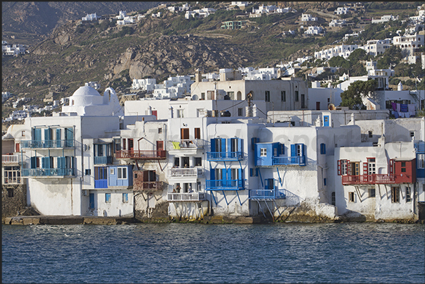 Ancient buildings directly overlook the sea